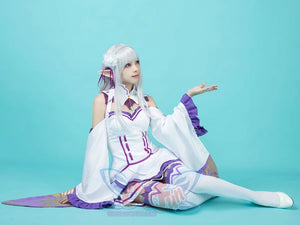 Re:Zero Emilia cosplay costume pairs a green gem collar and pointed ear tips over white thigh-high stockings.