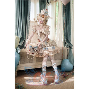 Rococo styling scene with a heart cake handbag carried as the main bag item