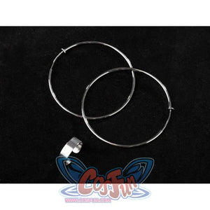 Two large silver hoop earrings and a matching silver ring accessory are displayed on a black background