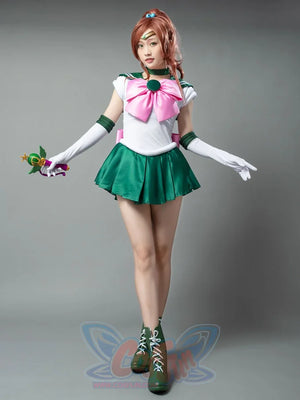 Sailor Jupiter cosplay costume front pose anchors the pink bow above crisp green pleats
