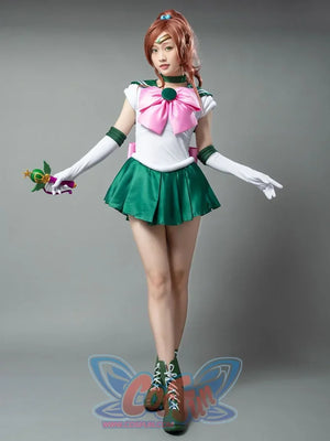 Sailor Jupiter cosplay costume front pose anchors the pink bow above crisp green pleats