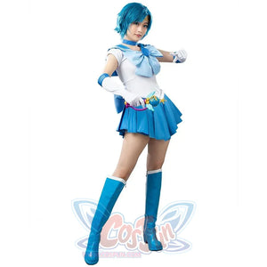 Ami Mizuno cosplay costume sets a gold tiara above a white bodice layered over bright blue pleats and a winged wand.