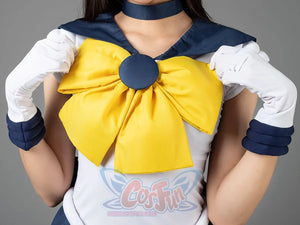Close-up of the Sailor Uranus Tenoh Haruka cosplay costume bow, yellow fabric set against navy trim
