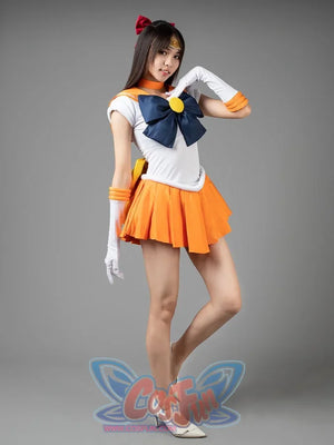 Sailor Venus Aino Minako cosplay costume angled pose is framed by white gloves and orange skirt folds