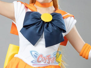 Close-up of the Sailor Venus Aino Minako cosplay costume bow, navy fabric circling a round yellow center