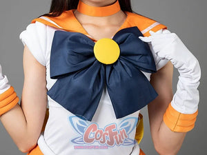 Close-up of the Sailor Venus Aino Minako cosplay costume bow, navy fabric gathered around a yellow center