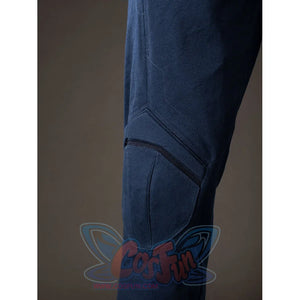 Steve Rogers cosplay knee armor close-up sets raised navy padding along the trouser leg.