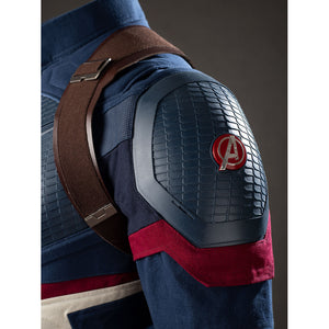 Steve Rogers cosplay shoulder armor detail sets a red emblem against textured navy panels.