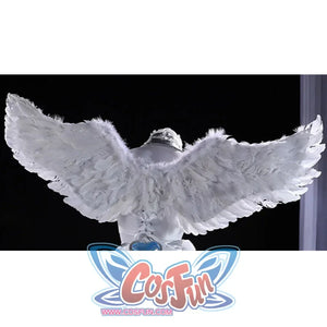 Panty & Stocking with Garterbelt Stocking cosplay angel wings span broad white feathers across a full rear view.