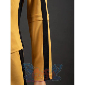 Close-up of The Bride Cosplay jacket sleeve with black vertical stripe, yellow cuff stitching and forearm seam