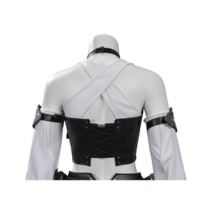 Tifa cosplay costume traces the back corset lacing of a black faux leather vest layered over a white ribbed cross-strap top.
