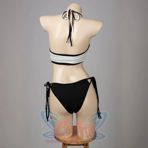 Final Fantasy VII Tifa Lockhart cosplay swimsuit turns the halter back ties above the black bikini bottom.