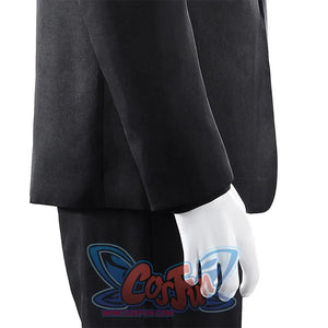 Harvey Dent Two-Face cosplay sleeve detail drops the black jacket cuff beside matching dark pants.