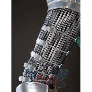 Victor Von Doom cosplay costume traces chainmail-pattern sleeve panels secured by silver-tone strap bands.