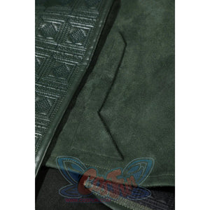 Doom Victor von Doom cosplay costume traces a dark seam across green cape fabric.