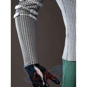 Victor Von Doom cosplay costume sleeve detail layers chainmail-pattern fabric beside a fitted black glove.