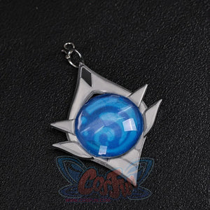 Vodyanitsa cosplay Vision flat lay with a round blue center and silver-tone pointed frame.