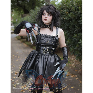 HORROR BISHOUJO Edward Scissorhands cosplay costume centers metallic scissor finger extensions over belted ruffled leather.