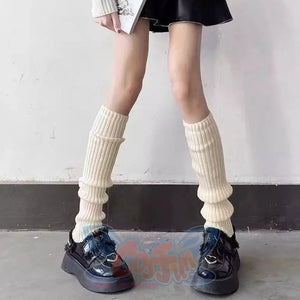 Extra long cream ribbed scrunched leg warmers 50cm length styled with black platform shoes