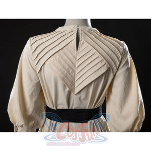 Witch Hat Atelier Coco Tetia Richeh cosplay robe back detail crosses cream pleated panels above a black waist sash.