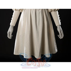 Witch Hat Atelier Coco Tetia Richeh cosplay robe skirt detail falls in soft cream folds below the black waist sash.