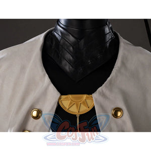 Witch Hat Atelier Qifrey cosplay collar detail anchors a gold-tone brooch between cream cape panels.