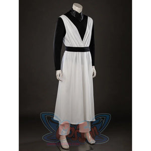 Witch Hat Atelier Qifrey cosplay robe angled view layers white panels over cropped pants and black sleeves.