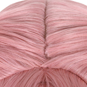Witch Hat Atelier Tetia cosplay wig close-up shows the pink fiber parting and blended gradient strands.