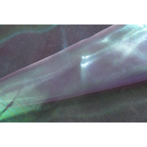 Wuthering Waves Aemeath cosplay iridescent gauze detail shifts blue and pink tones across a sheer panel.