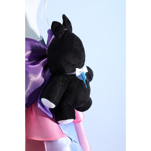 Wuthering Waves Denia cosplay black bear plush detail sits against purple satin and pink ribbon layers.