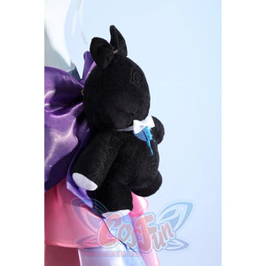 Wuthering Waves Denia cosplay black bear plush detail sits against purple satin and pink ribbon layers.