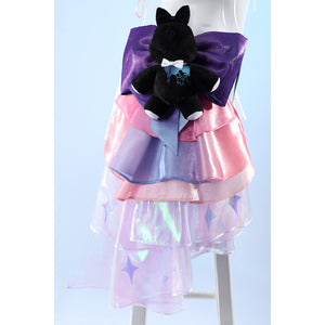 Wuthering Waves Denia cosplay side ribbon back detail cascades pink, purple, and iridescent panels beneath the plush.