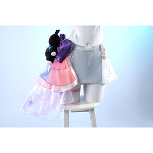 Wuthering Waves Denia cosplay side ribbon detail layers the black bear plush over satin bows and iridescent gauze.