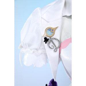 Wuthering Waves Denia cosplay sleeve brooch detail pins gold-tone buttons and charms beside white puff fabric.