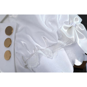 Wuthering Waves Denia cosplay sleeve button detail lines gold-tone buttons beside glossy white ruffles.