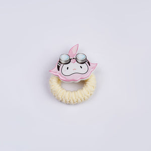 1883 Science and Medium Yongchu Taffy cosplay costume hair accessory centers a pink character charm above a yellow band.