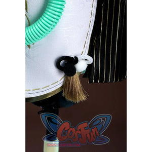 Zenless Zone Zero Dialyn cosplay side tassel detail hangs a brown tassel below black and white pom accents