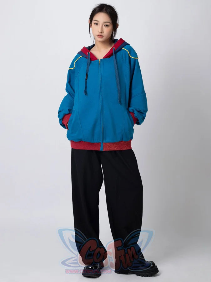 Full-body front view of woman wearing blue Homelander cosplay jacket with red accents