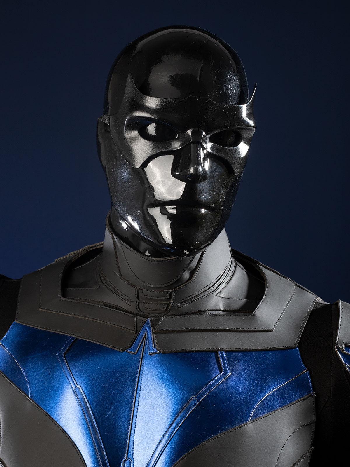Nightwing cosplay costume - Close-up of black mask helmet with reflective details
