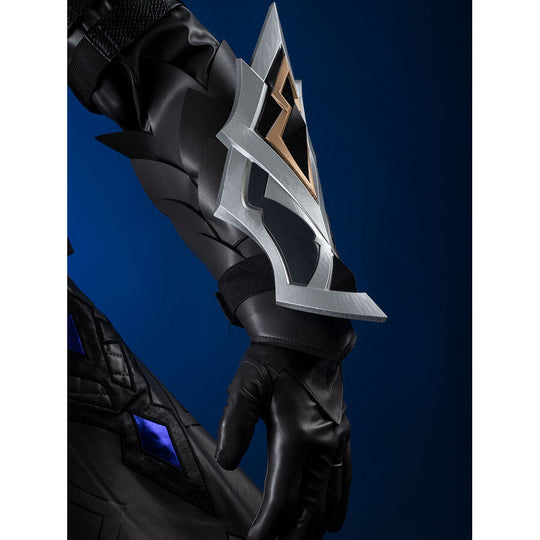 Genshin Impact Il Capitano cosplay gauntlet layers silver gold and blue triangular accents over segmented black hand armor.