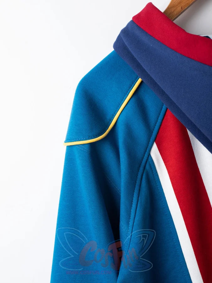 Close-up of blue Homelander cosplay jacket shoulder detail with yellow piping and color-block