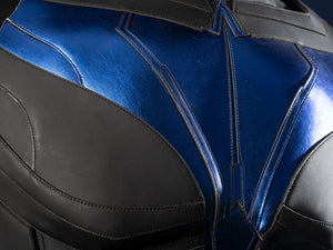 Nightwing cosplay costume - Chest armor detail showing blue wingding pattern texture
