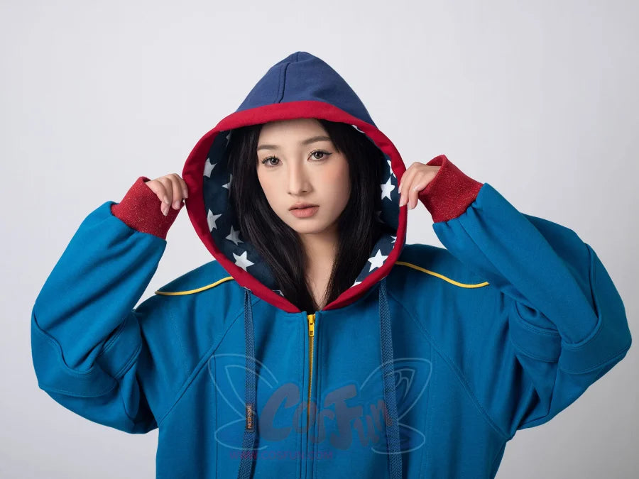 Close-up of woman adjusting Homelander cosplay jacket hood with star-patterned interior