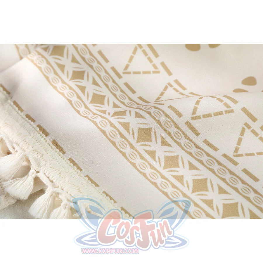 Moana cosplay skirt fabric close-up sets gold geometric designs beside frayed tassel fringe trim.