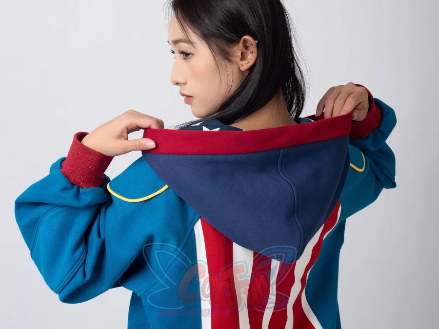 Side view of woman adjusting Homelander cosplay jacket hood with striped back design visible