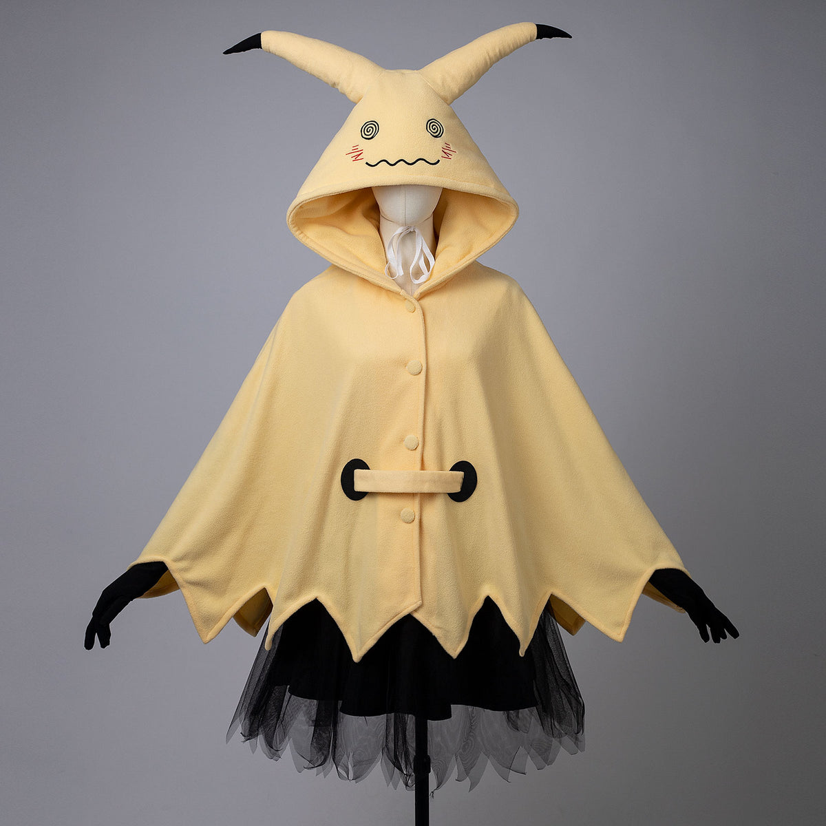 Yellow spark cute cape dress with adorable ears and jagged hem displayed on transparent background