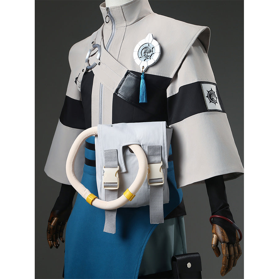 Close-up of Zanka cosplay costume chest pendant, blue tassel earring and waist belt details