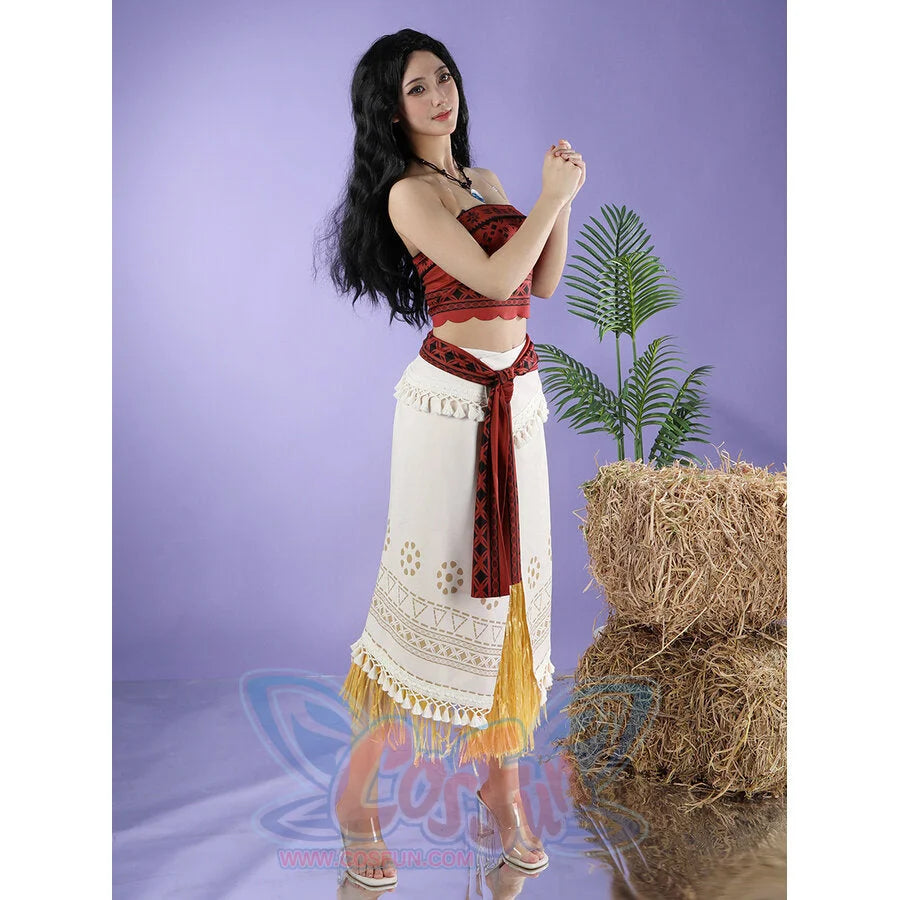 Moana cosplay wrap skirt anchors an embroidered fringed hemline beneath a red patterned tube top.
