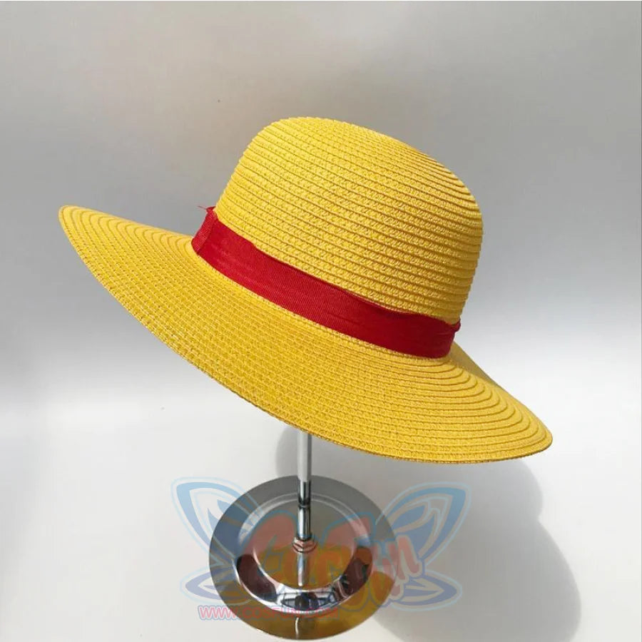 Japanese Anime Monkey D. Luffy cosplay straw hat frames a wide rounded brim anchored by a solid red fabric band.