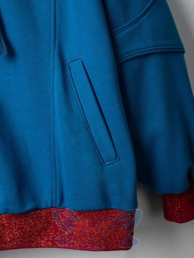 Detail of blue Homelander cosplay jacket side pocket with red ribbed hem at bottom